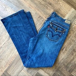 Levi’s Red Tag Medium Wash Bootcut 515 12